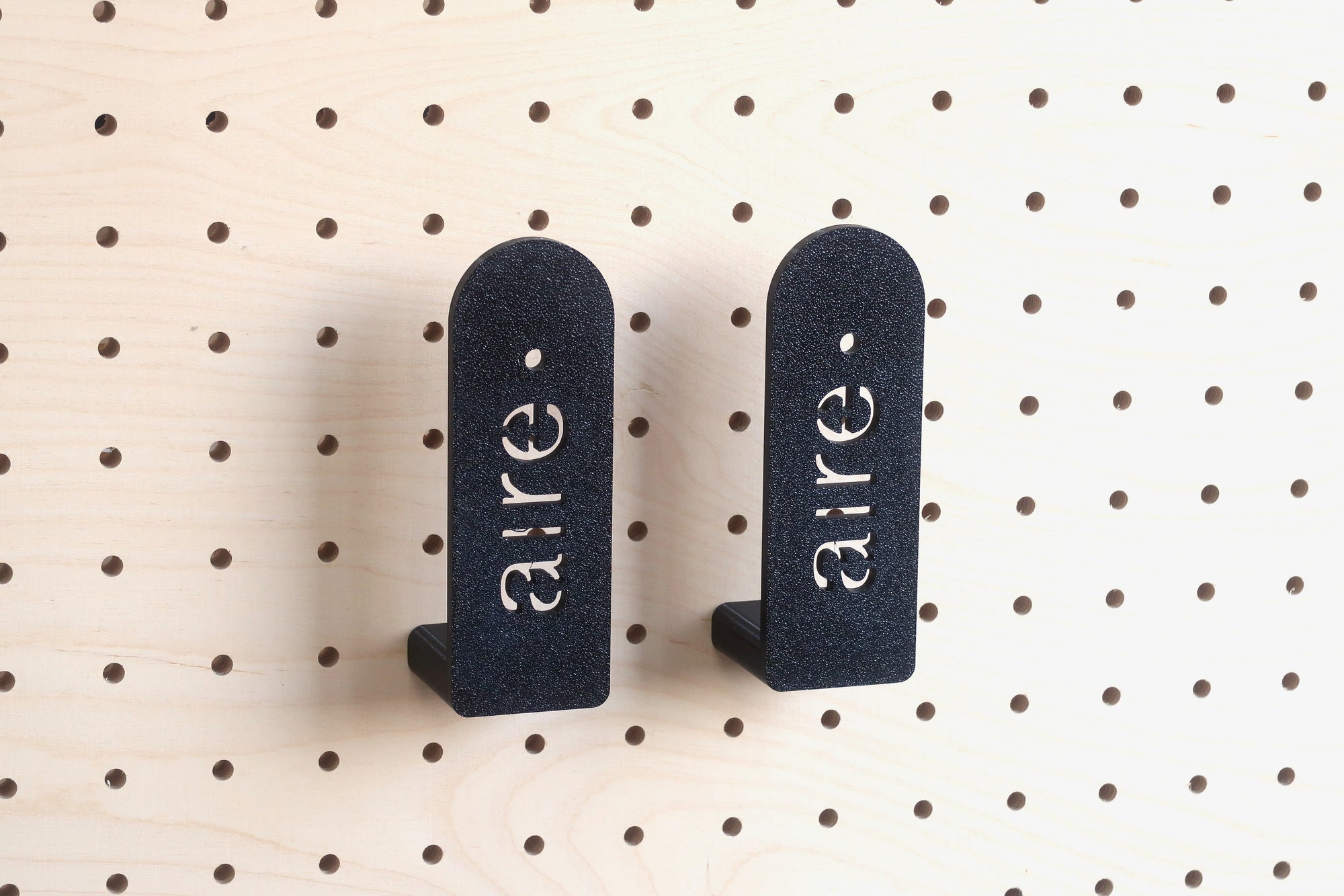 Glove and mitten holder for perforated panels