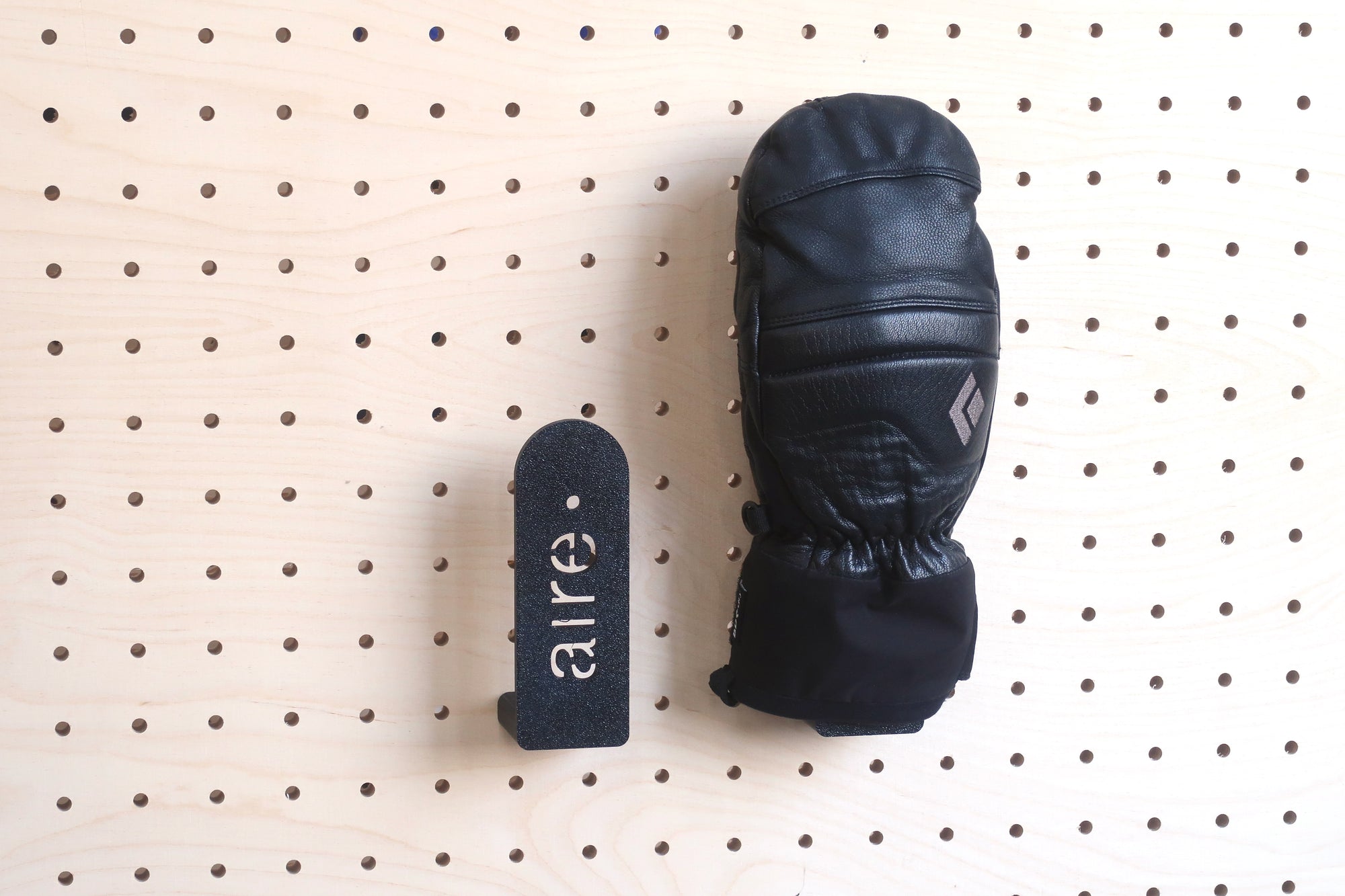 Glove and mitten holder for perforated panels
