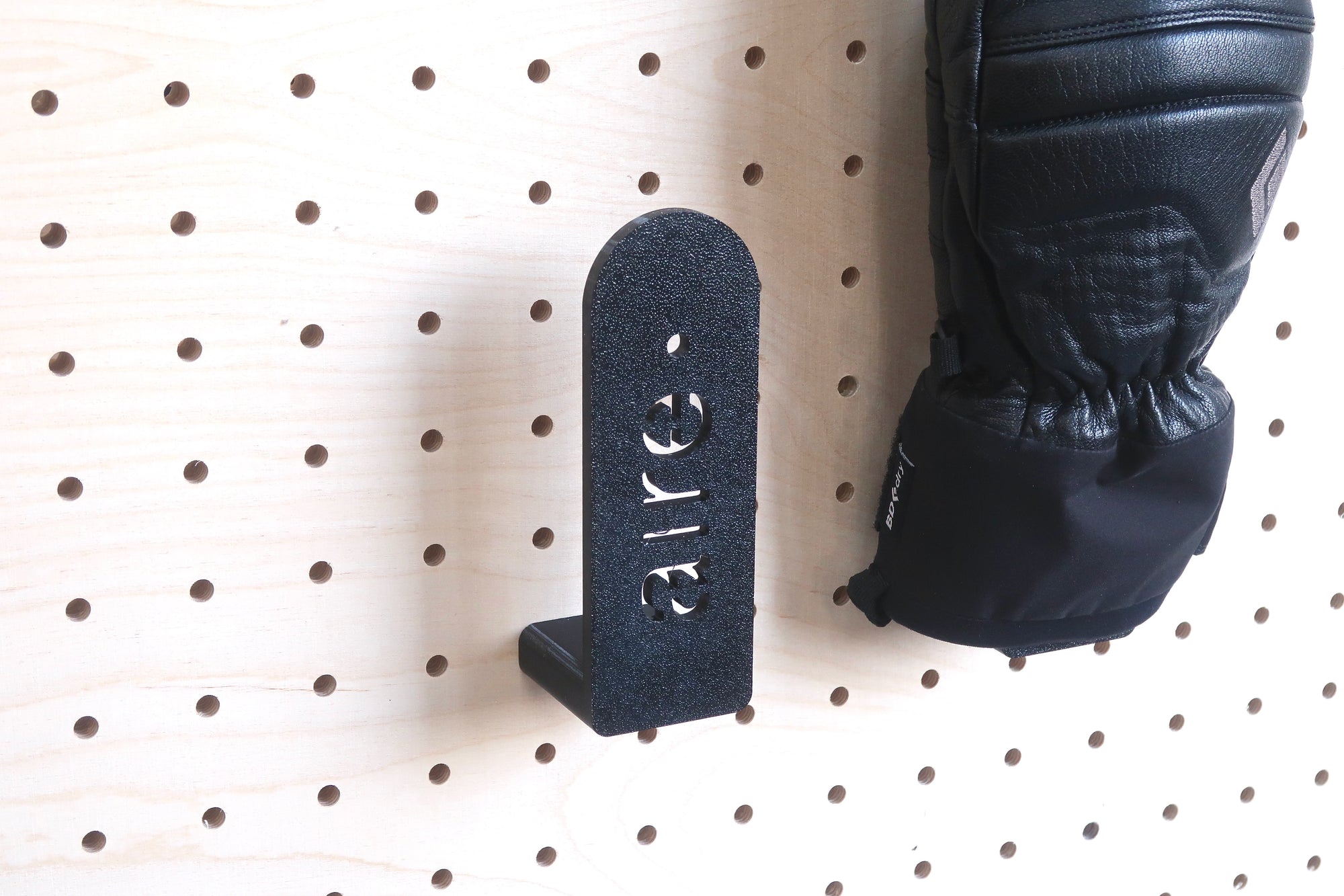 Glove and mitten holder for perforated panels