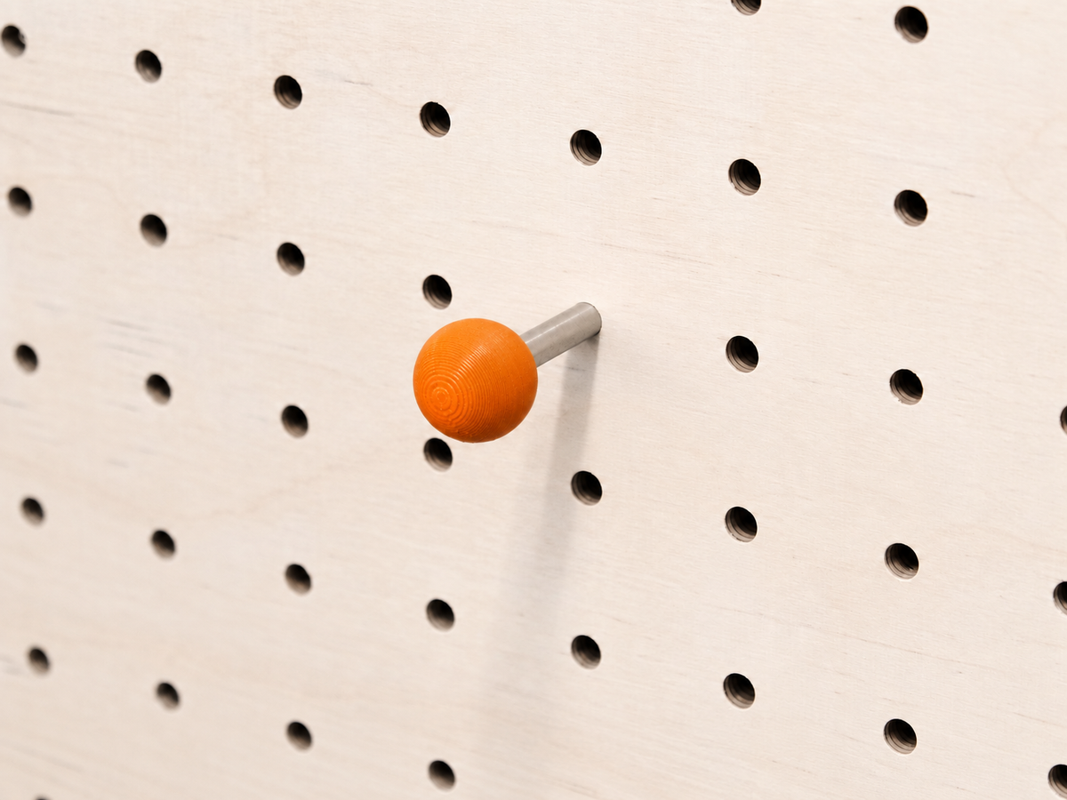 Orange peg for pegboard – Aire
