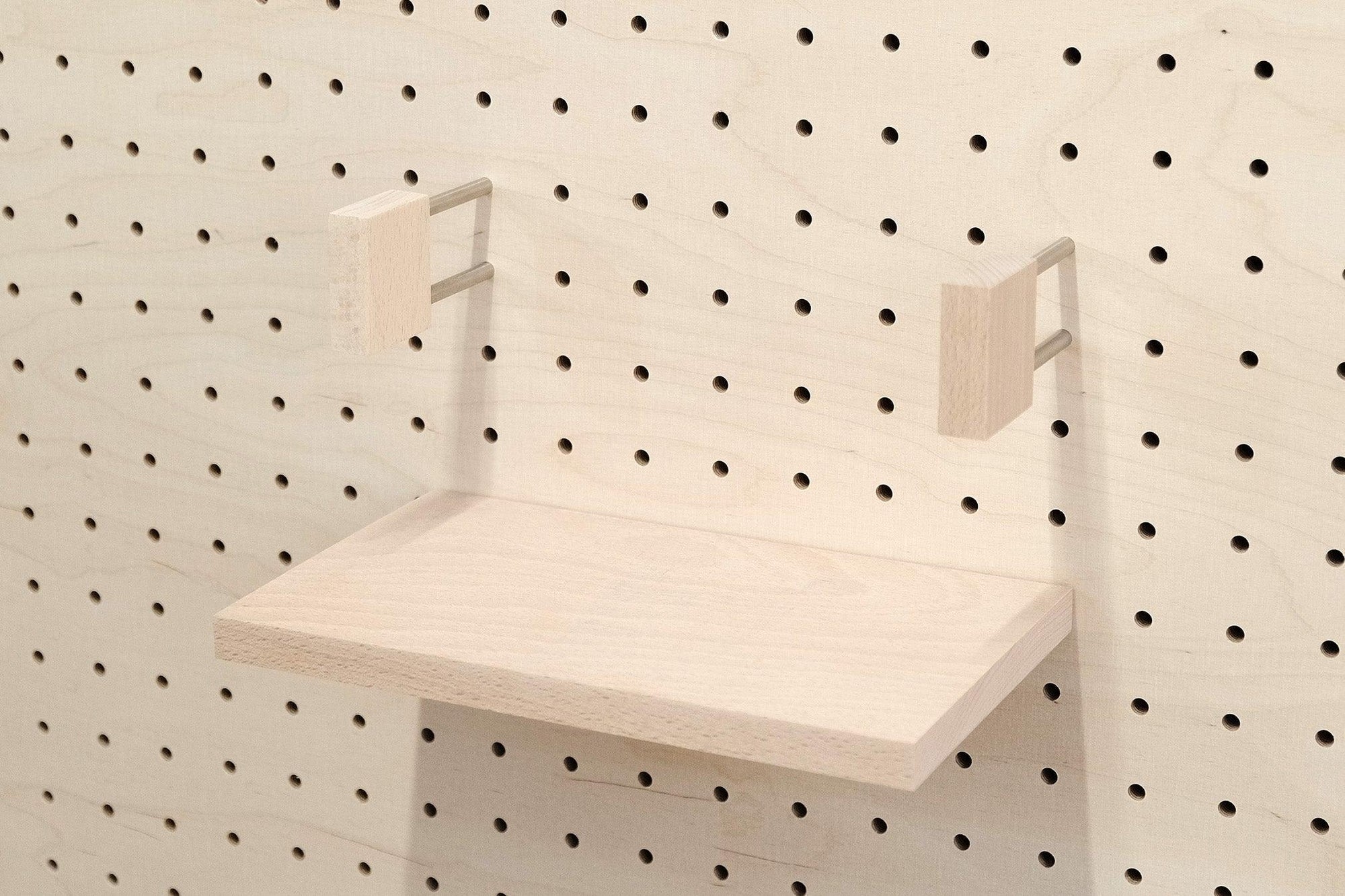 Serre livre minimaliste : accessoire pour organiser votre bibliothèque sur un Pegboard - Quark